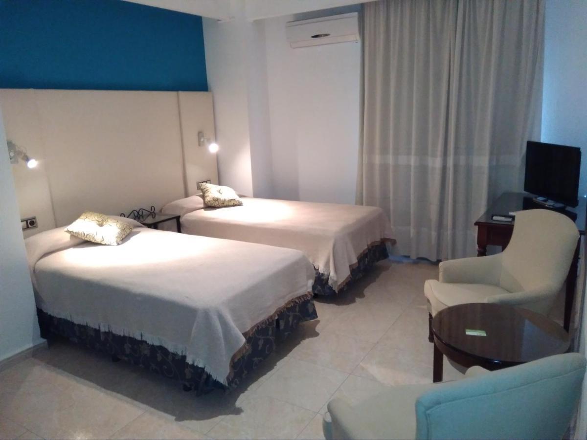 Hotel Nuevo Ara Caceres Phòng bức ảnh